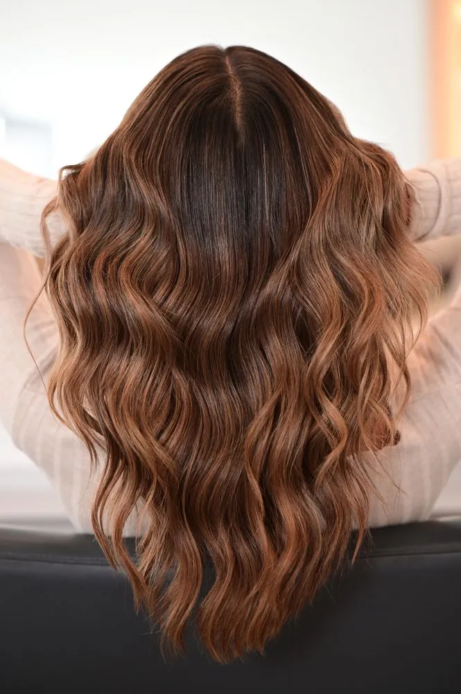 Woman,With,Beautifully,Curled,Brown,Hair